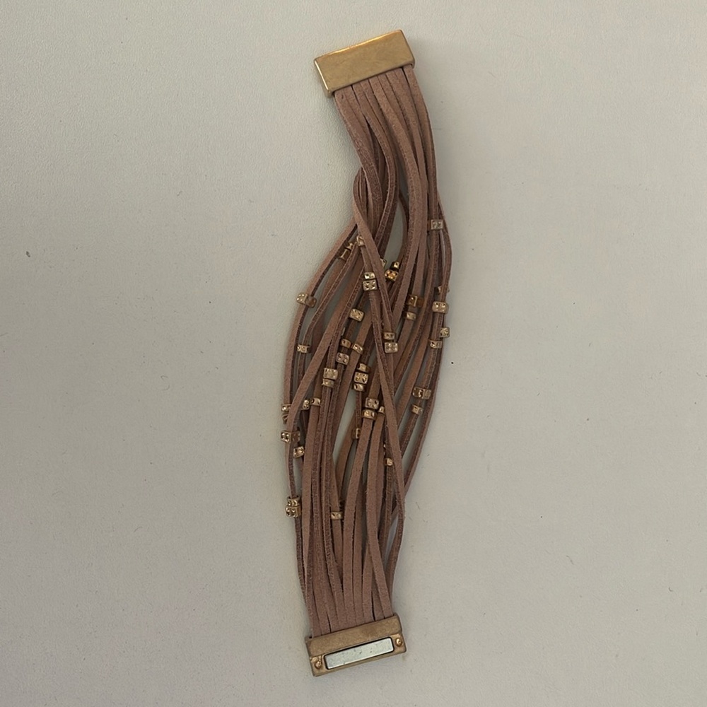 Tan and gold bracelet